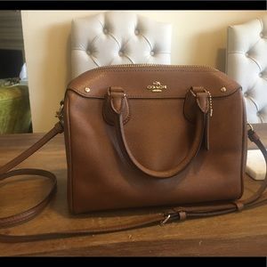 Coach purse, never used. Brown with gold accents